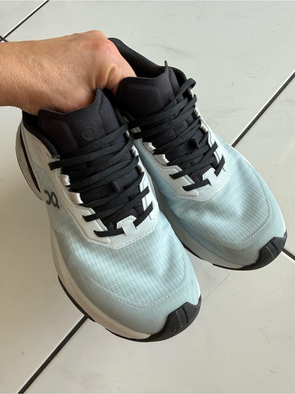 On Running Athletic Shoes in Light Blue and Black
